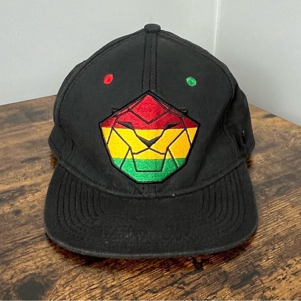 No Bad Ideas hemp cotton blend red yellow green on black lion snap back hat.